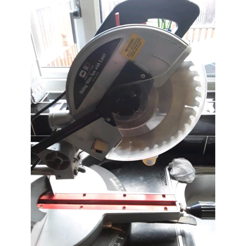 Sliding chop saw mitre saw with laser