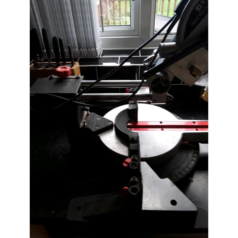 Sliding chop saw mitre saw with laser