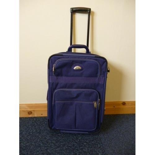 Wheel along Purple Suitcase Expandable Multiple pockets Carry on size