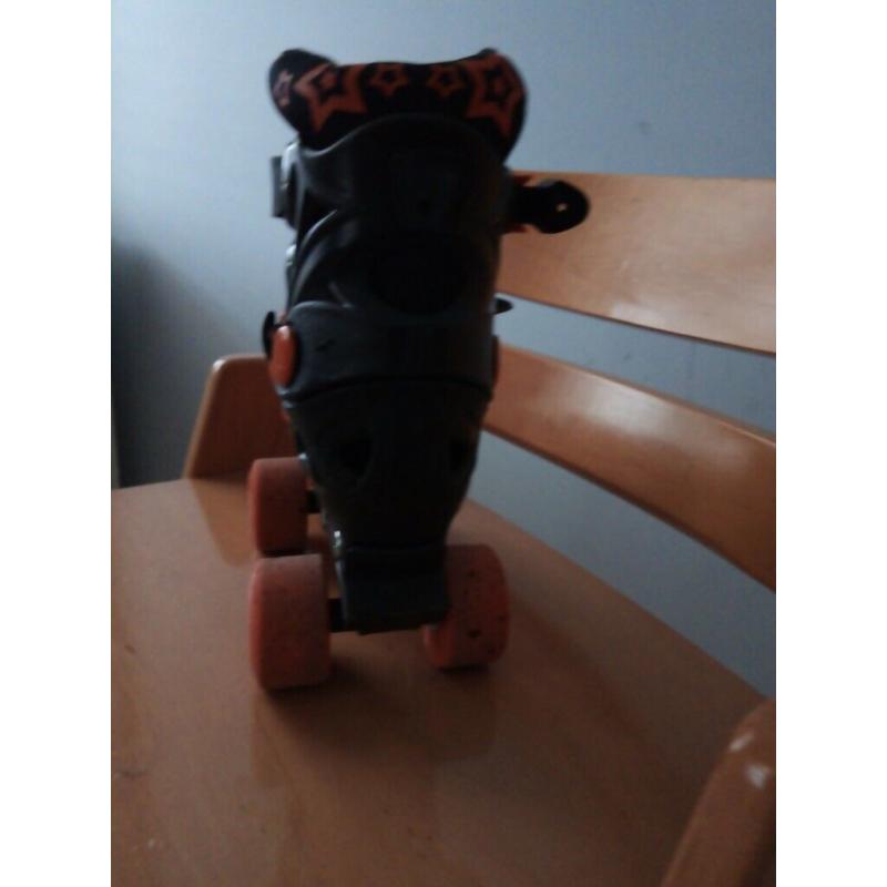 Quad skates in box size 29-32 (4 adjustable sizes)