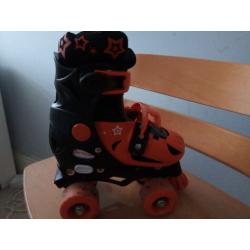 Quad skates in box size 29-32 (4 adjustable sizes)